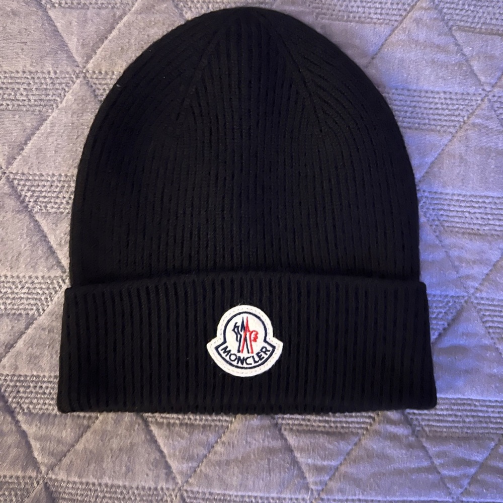 NWOT Moncler beanie unused, 100% original… 
Made of wool to keep you warm